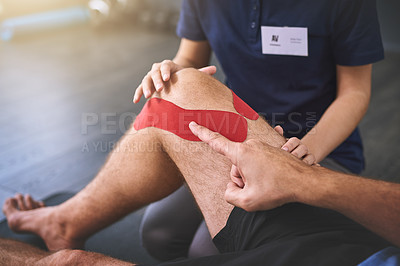 Buy stock photo High angle shot of an unrecognizable female physician working with a senior male patient