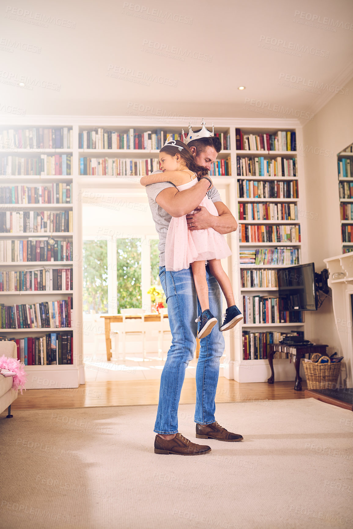 Buy stock photo Father, daughter and hug in home for games, playing dress up and fantasy games in living room. Dad, girl and embrace for support or love in relationship, child development and parent for bonding