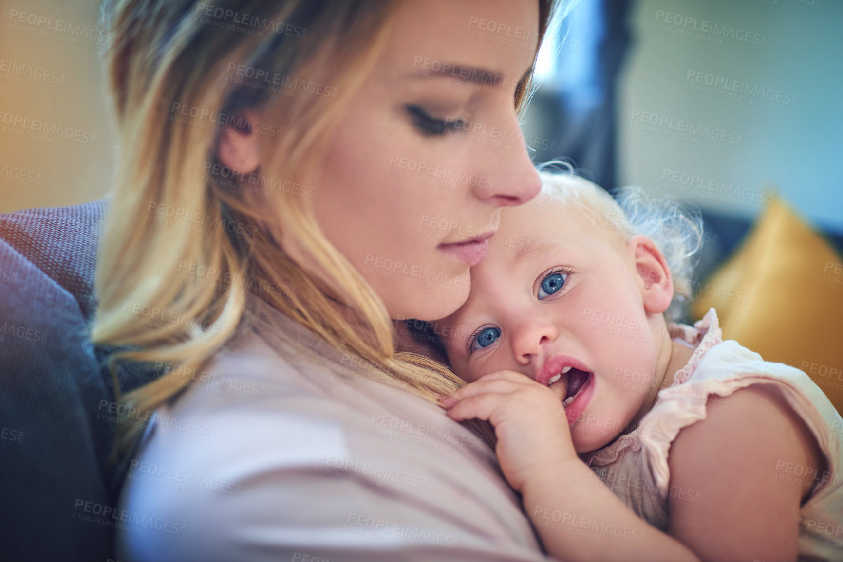 Buy stock photo Shot of an adorable baby girl bonding with her mother at home