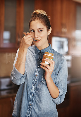 Buy stock photo Happy woman, container and eating peanut butter in kitchen with spoon, vegan diet and nutrition in home. Female person, health and snack in apartment for vitamins, breakfast and energy in morning