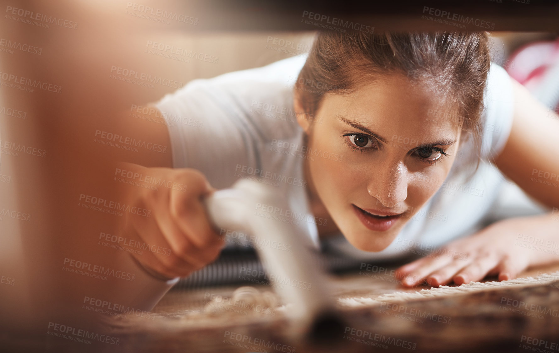 Buy stock photo Woman, vacuum and cleaning floor in home for hygiene, housework or housekeeping service for safety. Chores, maid and electrical appliance to suck dirt, dust and bacteria on carpet with face closeup