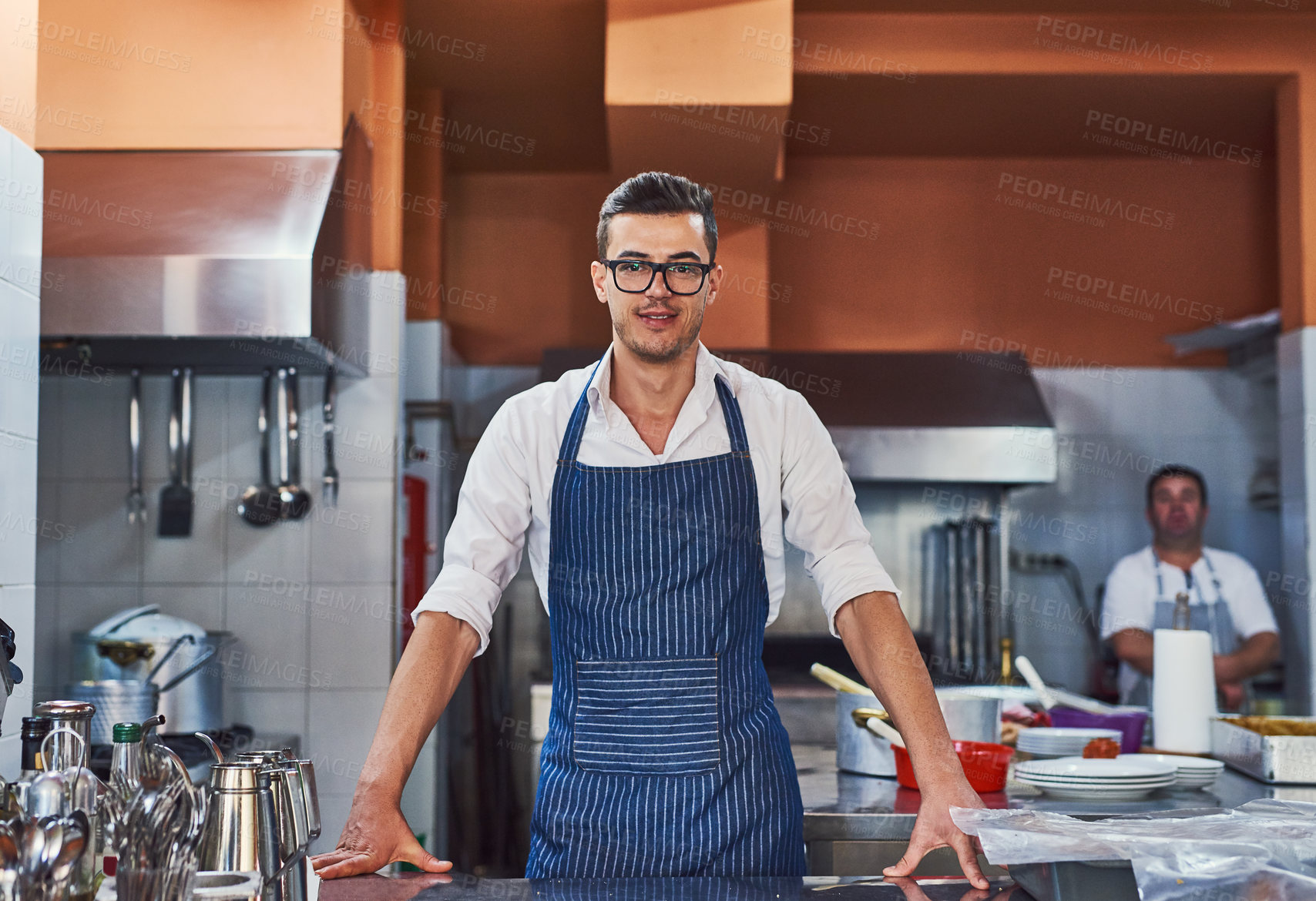 Buy stock photo Shot of men working at a restaurant