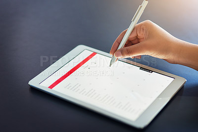 Buy stock photo Closeup shot of an unrecognizable businesswoman using a stylus on a digital tablet