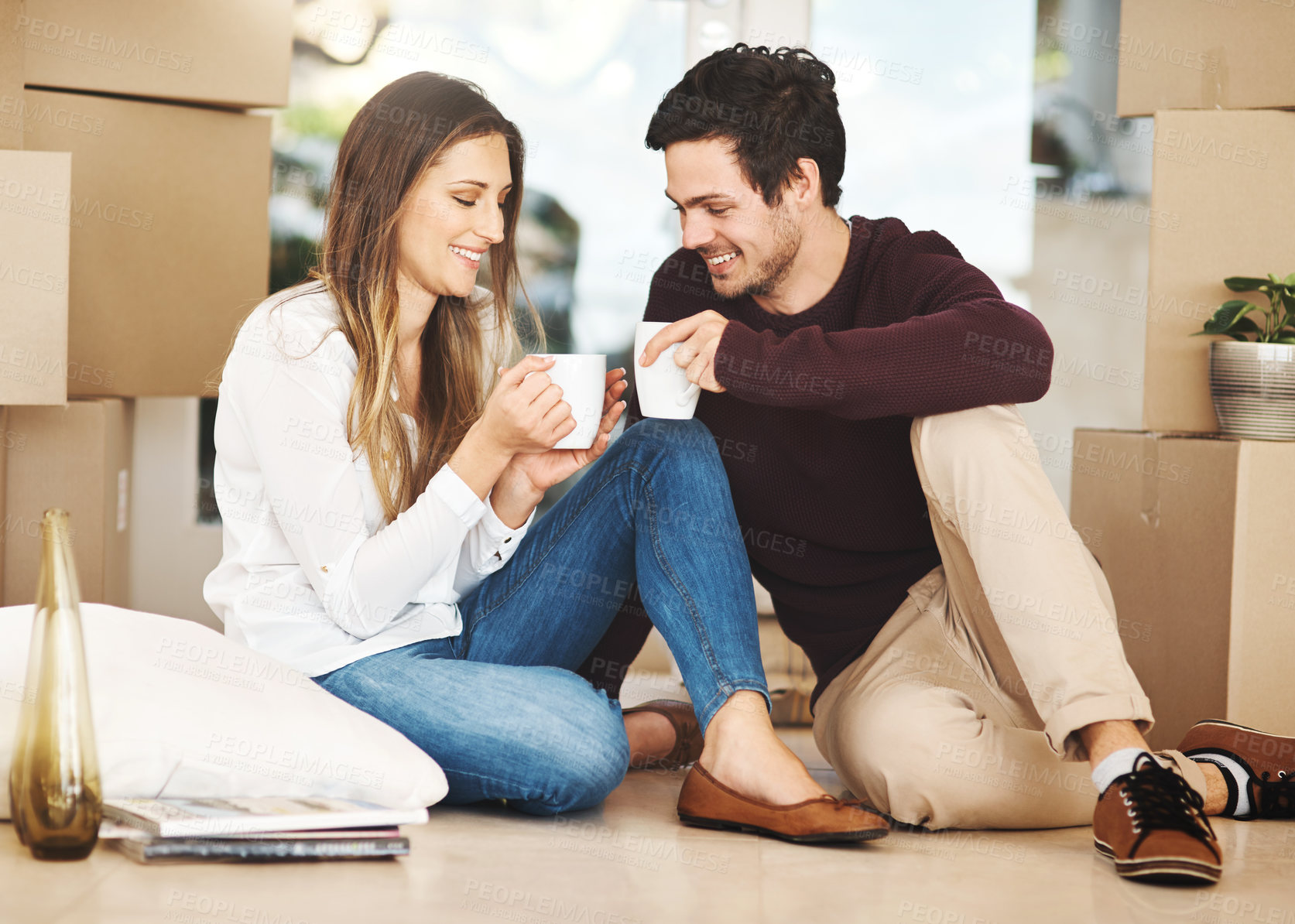 Buy stock photo Couple, people and smile with new house on coffee for moving in, unpacking and break. Relationship, home and love with bonding or happy for support, care and positive for ownership with fun and boxes