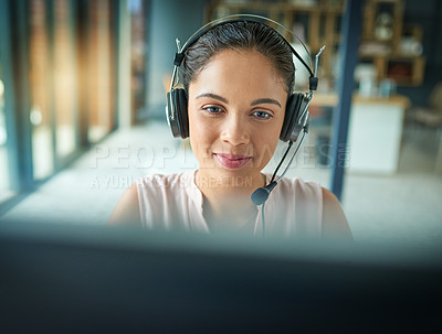 Buy stock photo Shot of a young woman working in a call center