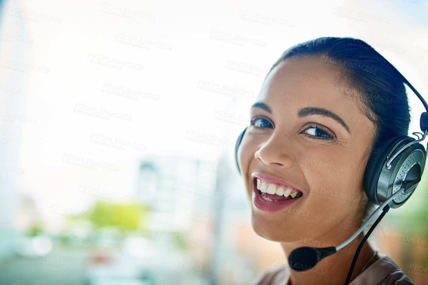 Buy stock photo Shot of a young woman working in a call center