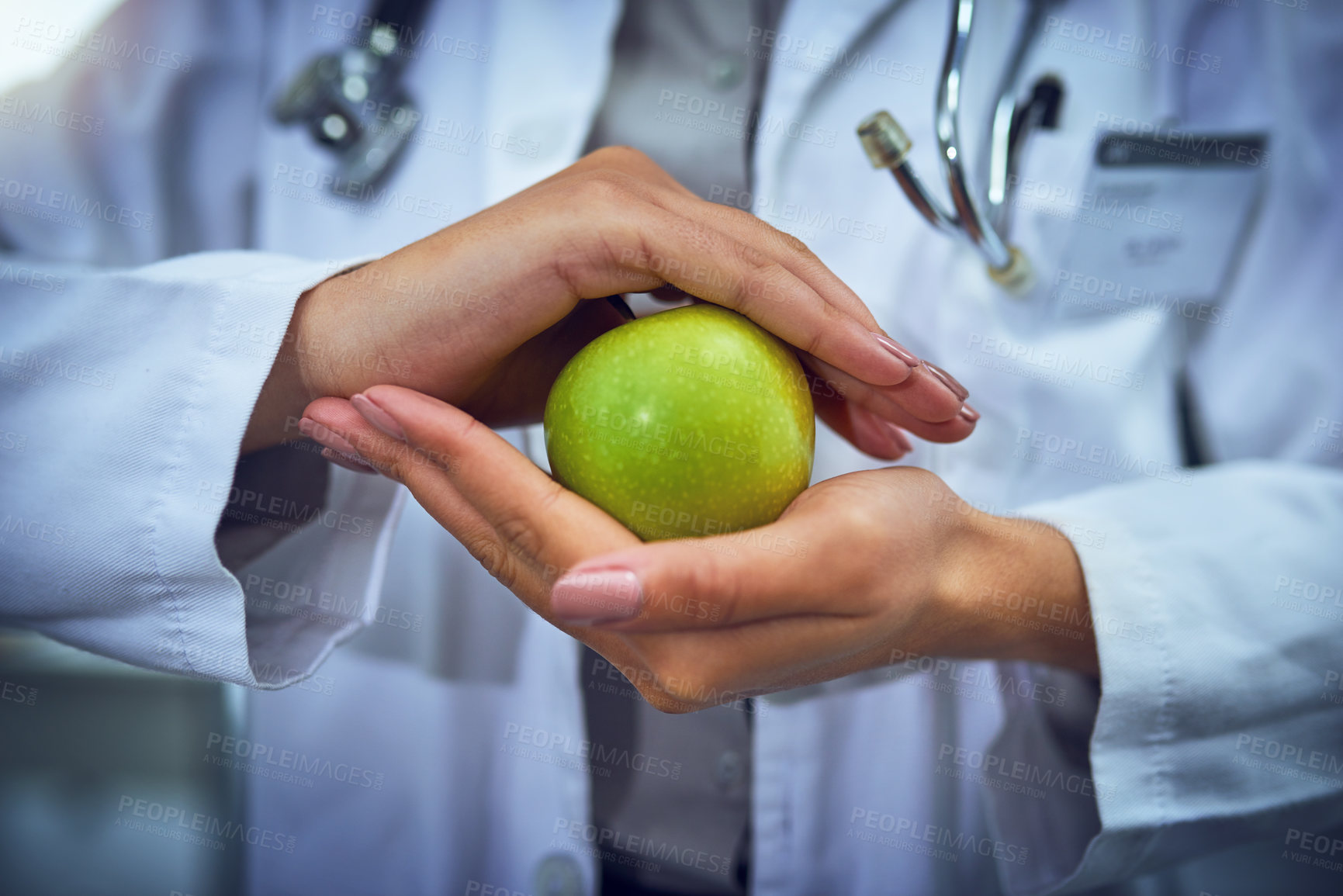 Buy stock photo Woman, doctor and apple in hands for nutrition, dietician and specialist for healthcare service. Female person, nutritionist and physician promotion for fruit wellness, consulting and organic food