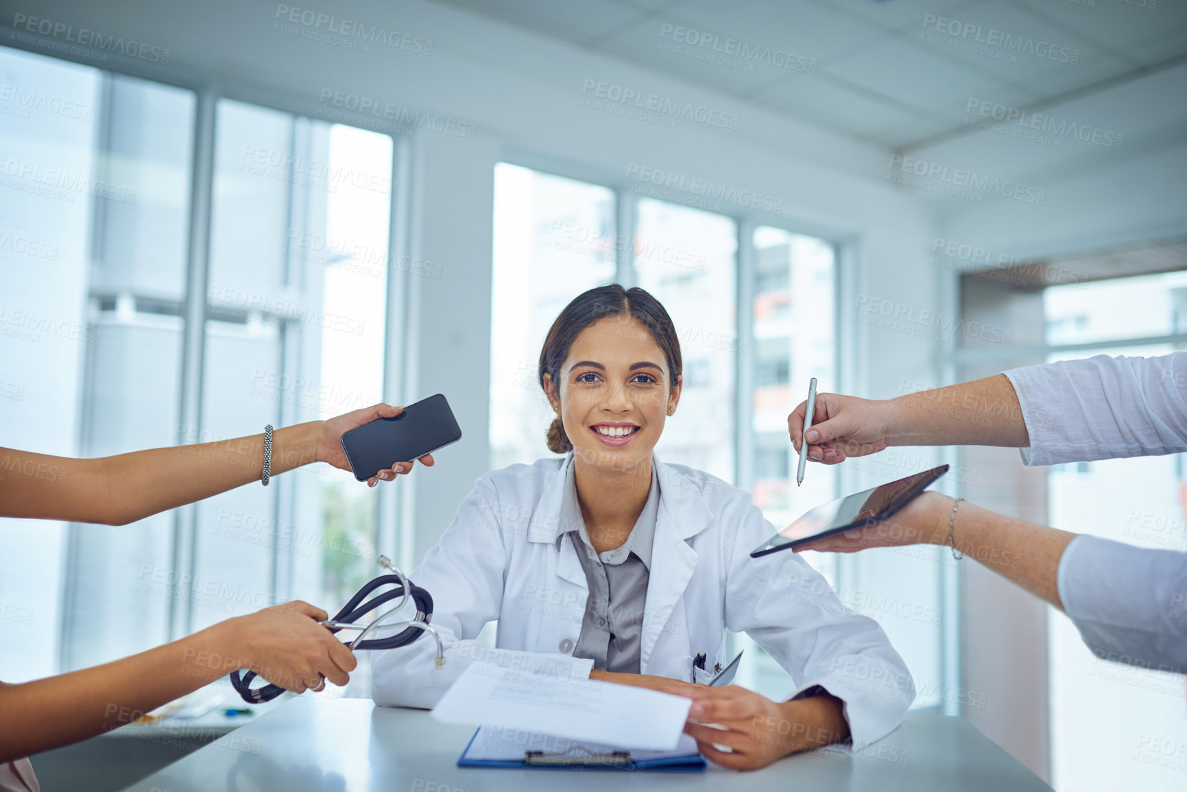 Buy stock photo Doctor, portrait and woman with multitasking and hands to show workload and healthcare demand with smile. Confidence, medical and happy surgeon in clinic with clipboard and hospital care for job