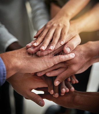 Buy stock photo Hands of group of corporate business people in unity for motivation, success and showing teamwork. Team of workers, employees and colleagues piling hands together for support, trust and victory
