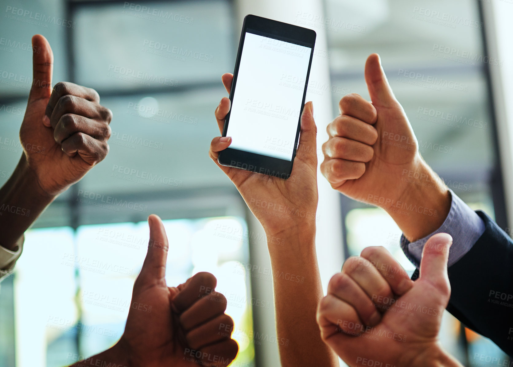 Buy stock photo Thumbs up, support and blank phone screen shown by professional corporate business people in an office together. Employees and colleagues showing agreement while holding a device with information