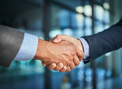 Buy stock photo Handshake and teamwork with hands of two corporate and professional business colleagues or coworkers. An agreement, deal or partnership between merging companies to unite together and achieve success