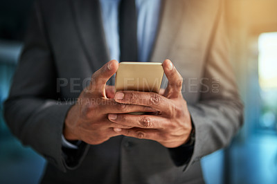 Buy stock photo Business man browsing the internet on his phone texting and posting on social media. Closeup of a male entrepreneur browsing or searching a website or web for news or clickbait