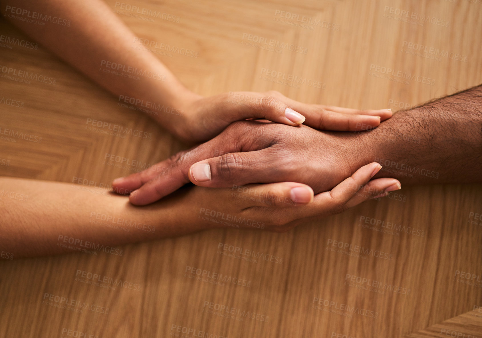 Buy stock photo Holding hands in love and support, showing care, comfort and consoling a friend. Two people together in unity, solidarity and trust, showing hope, faith and kindness while helping and bonding closeup