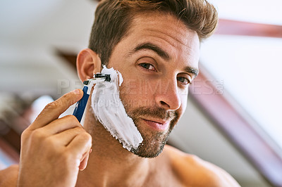 Buy stock photo Portrait, man and shaving beard for hair removal, aesthetic skincare and facial cleaning at home. Face of guy, foam and and razor to shave with cream cosmetics, blade and morning routine in bathroom
