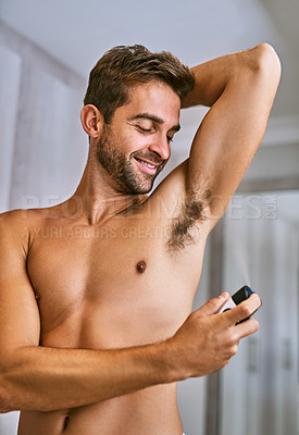Buy stock photo Deodorant, man or spray armpit after shower in home for hygiene, male grooming or perfume to control sweating. Happy shirtless guy cleaning underarm with fragrance cosmetics, body product or skincare