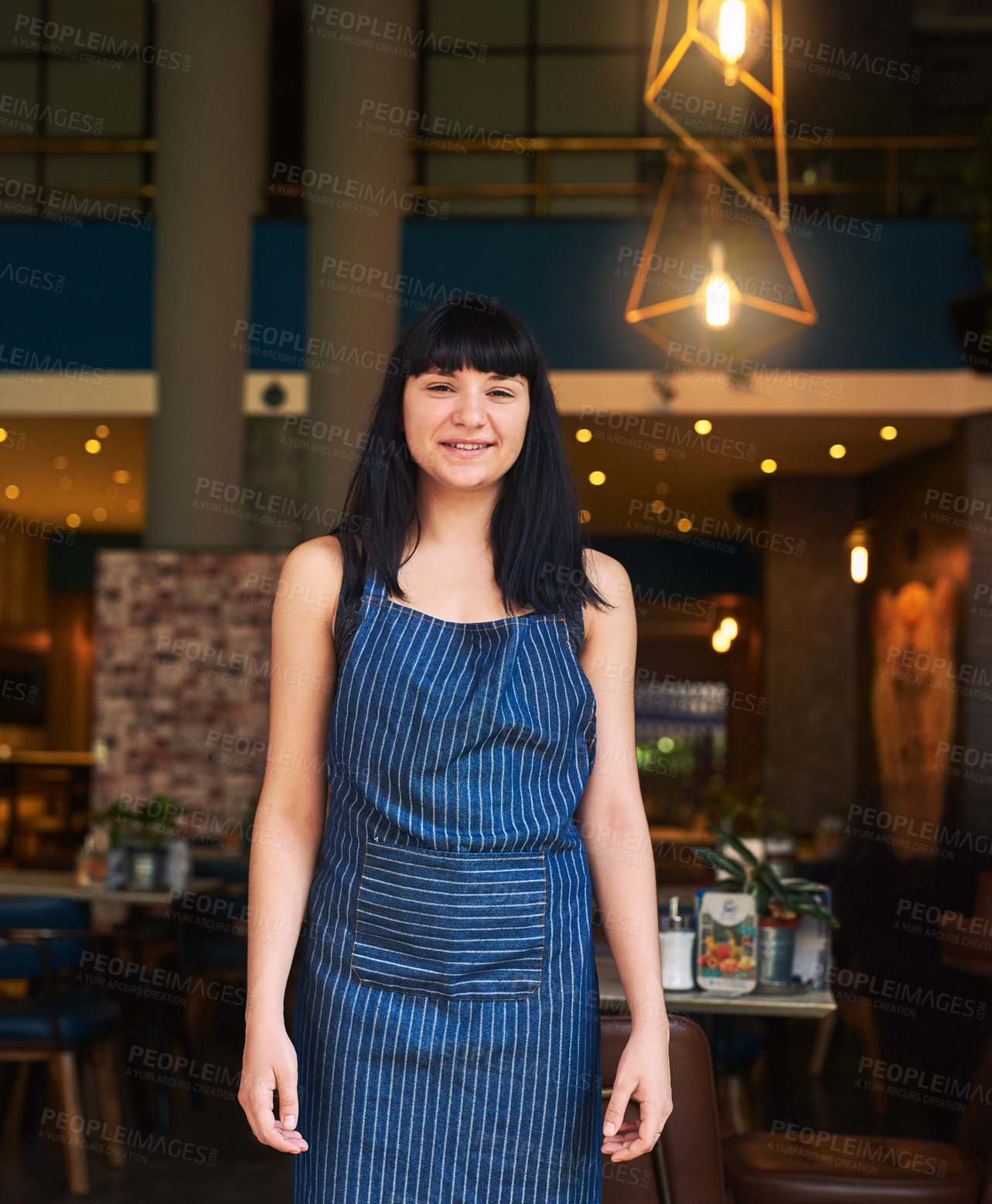 Buy stock photo Small business, woman and happy at cafe as waitress on portrait with confidence and proud. Female person, restaurant and smile for growth, progress and satisfied as barista for career in Spain