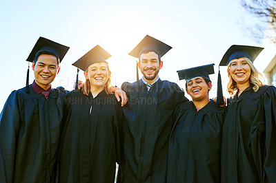 Buy stock photo Portrait of a group of students on graduation day