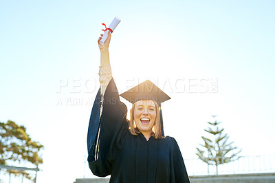 Buy stock photo Portrait of a student holding her diploma on graduation day