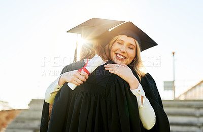 Buy stock photo Education, graduation and hug with student friends outdoor on campus for celebration or ceremony. Certificate, embracing and smile with happy graduate women at college or university for success