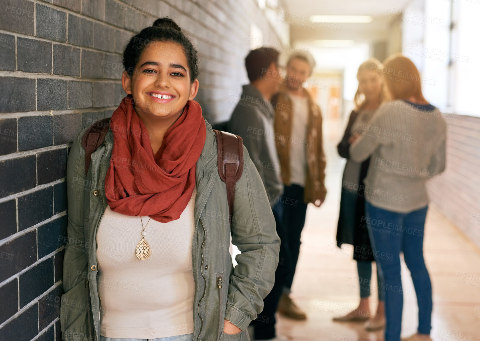 Buy stock photo Student, girl and portrait in hallway of university or college for scholarship, higher education and learning knowledge. Female learner, happy and corridor on campus for study of english literature.