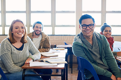 Buy stock photo Cropped portrait of a group of university students sitting in class during a lecture