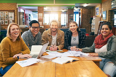 Buy stock photo Portrait of a cheerful young group of students studying together while having a discussion inside of a library