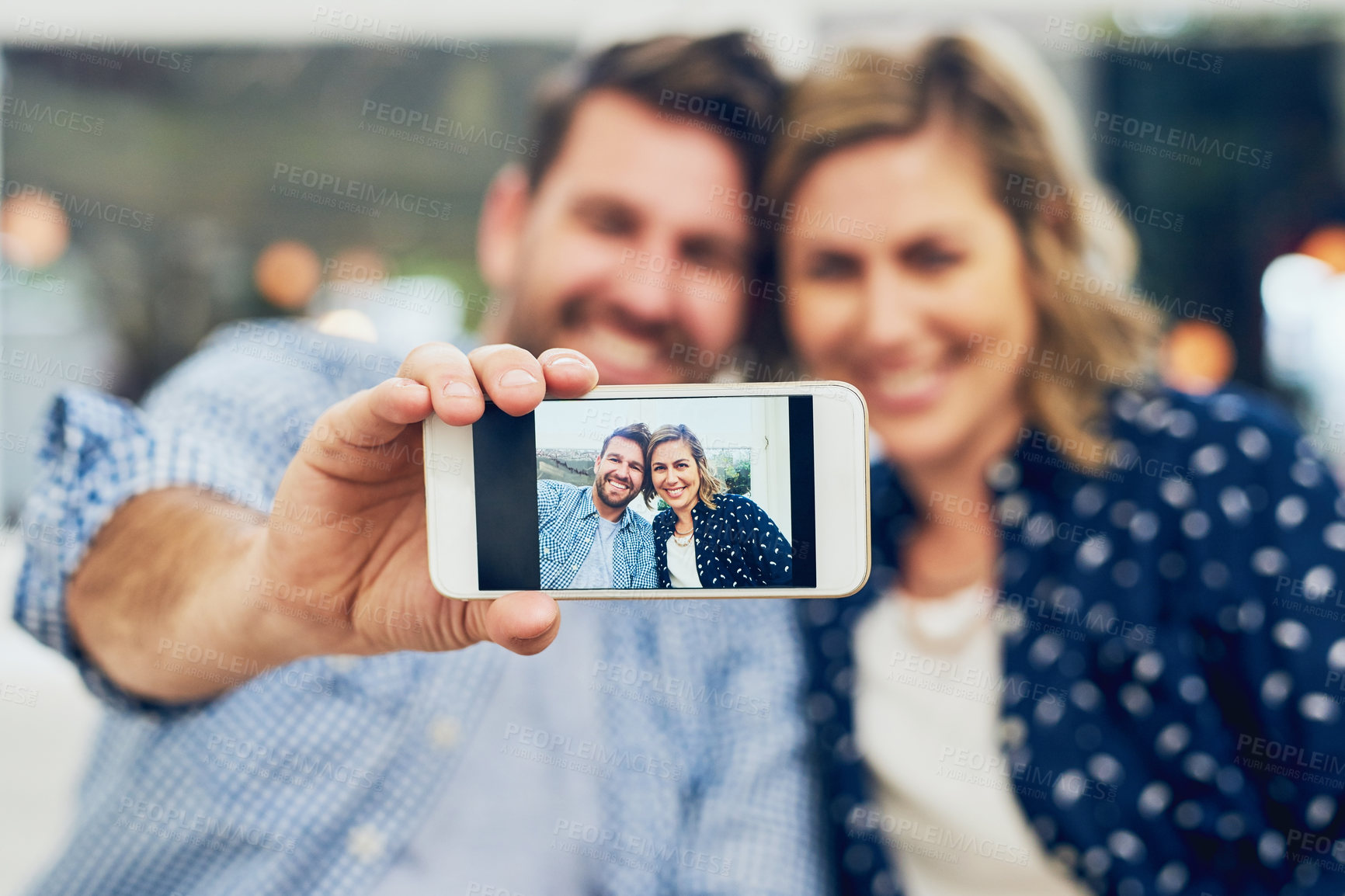 Buy stock photo Happy couple, phone and camera with selfie on sofa for photography, picture or memory at home. Young man, woman or lovers with smile, mobile smartphone display or screen for bonding moment at house