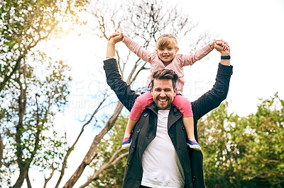 Buy stock photo Shot of a father and daughter bonding outside