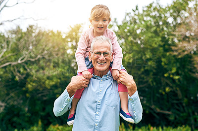 Buy stock photo Shot of a grandfather bonding with his granddaughter