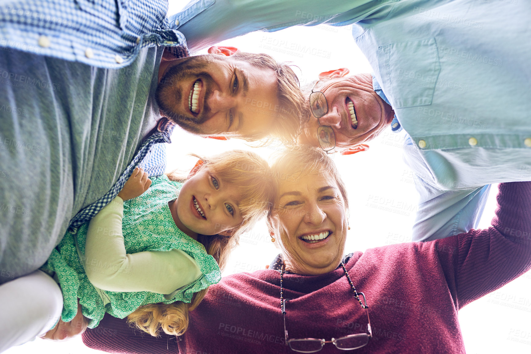 Buy stock photo Outdoor, smile and portrait of family in circle, connection and bonding together for happy people. Grandparents, joyful and father with children on vacation, weekend holiday and low angle in Germany