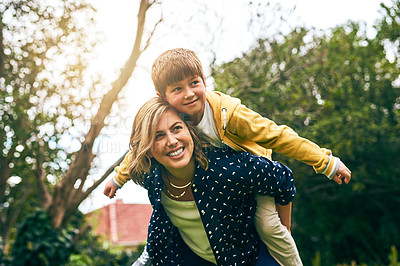Buy stock photo Shot of a mother bonding with her son outside