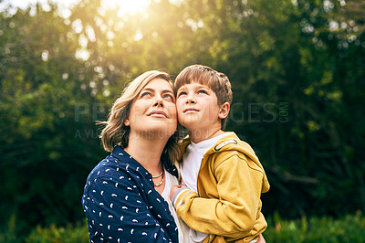 Buy stock photo Shot of a mother and her son bonding outside