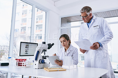 Buy stock photo Scientist, tablet and teamwork in forensic science looking at experiment results or collaboration at laboratory. Woman and man in medical research working on technology for scientific research in lab