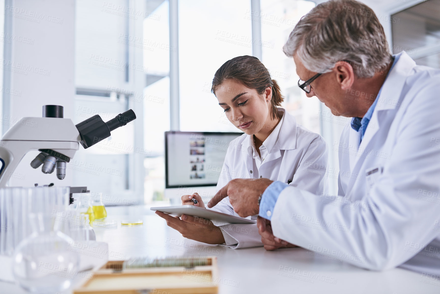 Buy stock photo Scientist, tablet and team in forensic science looking at experiment results or collaboration at laboratory. Woman and man in medical research working on technology for scientific research in the lab