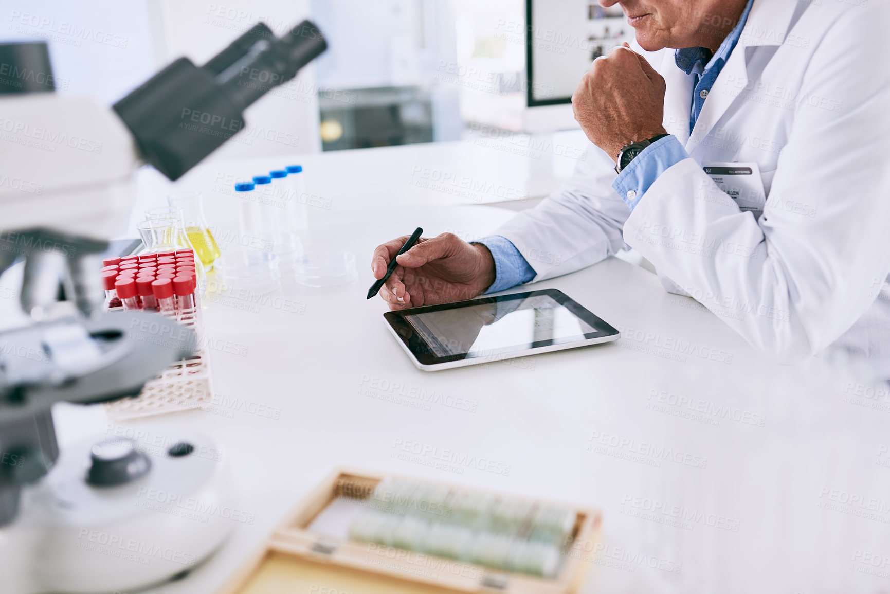 Buy stock photo Hands, tablet and science with person in laboratory at desk for breakthrough, innovation or research. Discovery, pharmaceuticals and technology with scientist at work on clinical trial or experiment