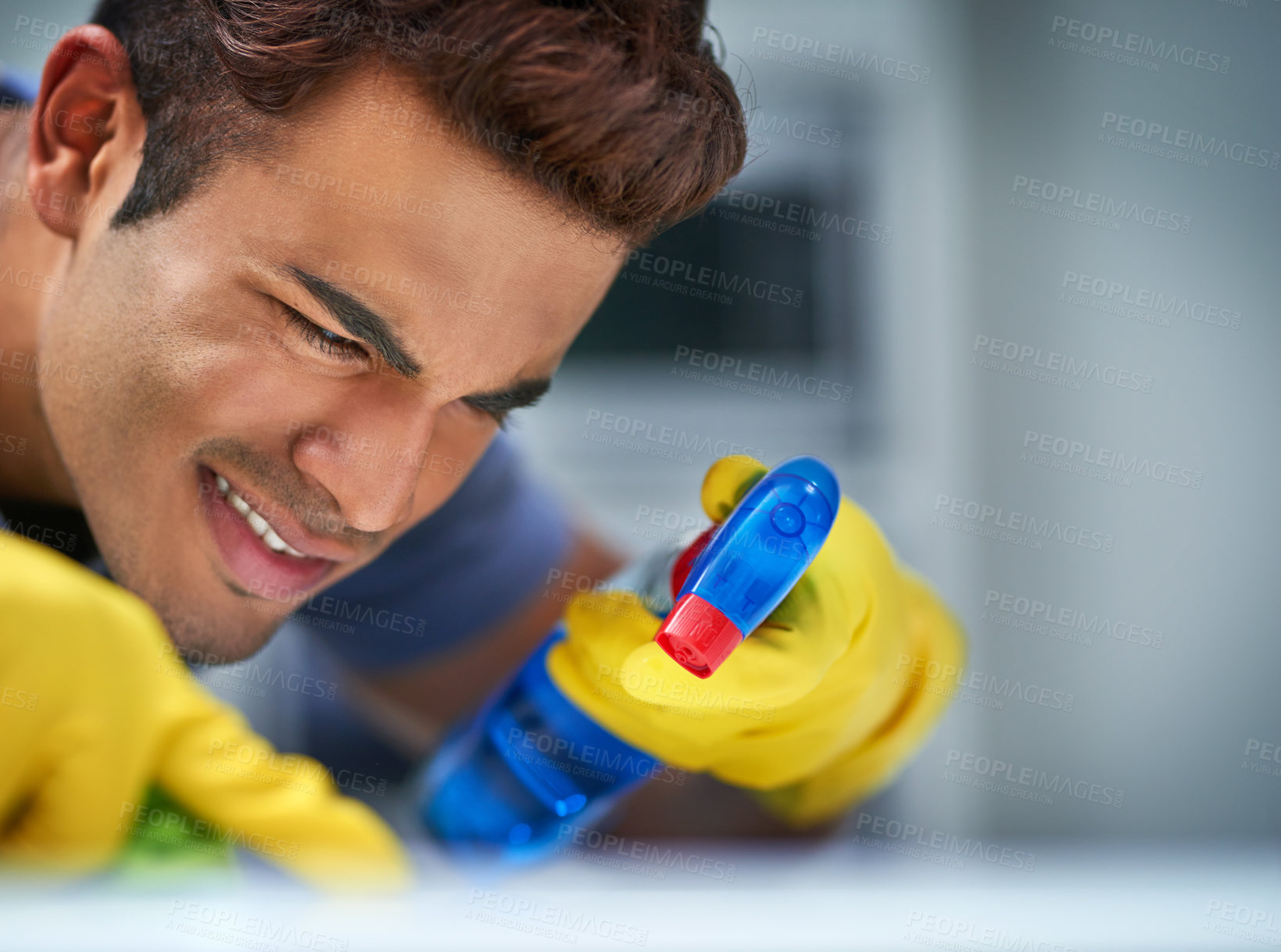 Buy stock photo Spray, cleaning and man with gloves, chores and routine for hygiene of house, sanitary and equipment. Home, tidy and person with bottle for disinfection, product and chemical for polishing of surface