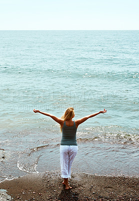 Buy stock photo Back, holiday and woman on beach for peace, weekend break and tropical destination for abroad getaway. Mockup space, travel adventure and person by ocean for vacation, high angle and trip in Morocco
