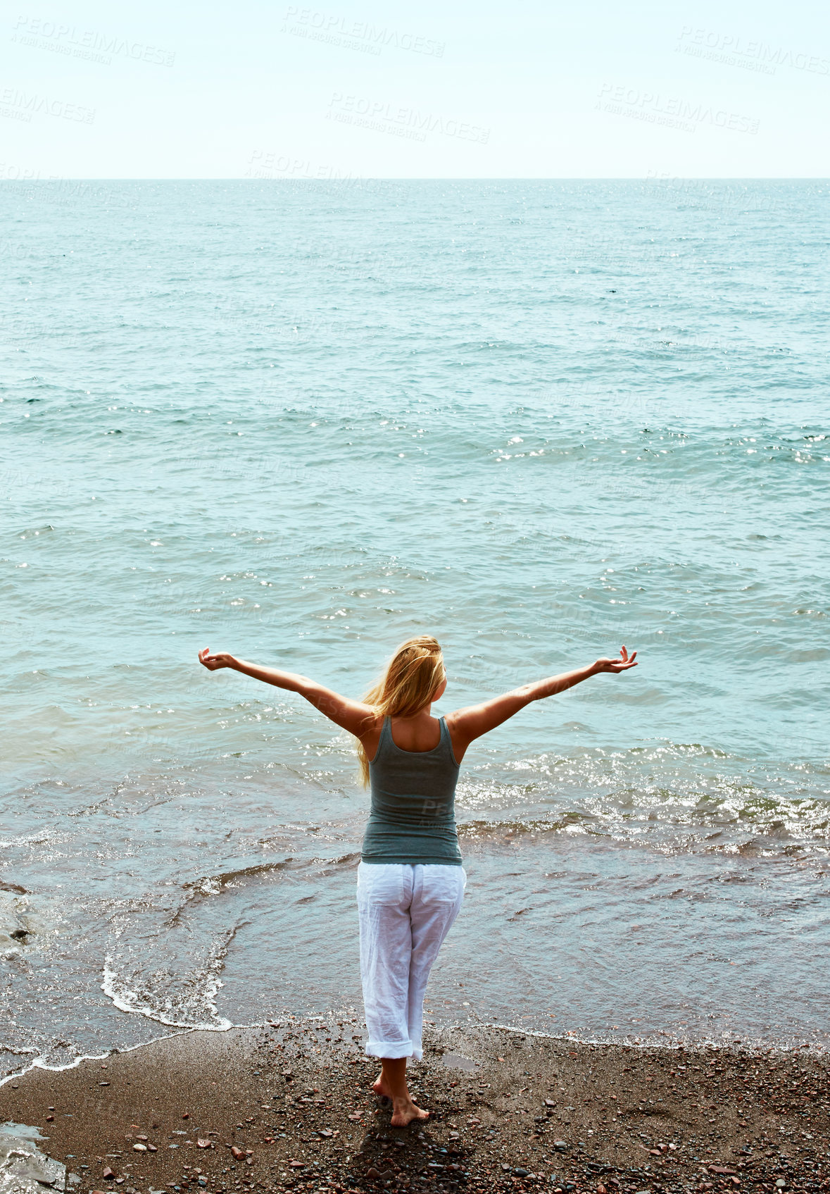 Buy stock photo Back, holiday and woman on beach for peace, weekend break and tropical destination for abroad getaway. Mockup space, travel adventure and person by ocean for vacation, high angle and trip in Morocco