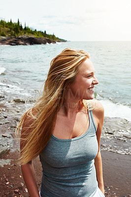Buy stock photo Young woman, walking and smile for beach holiday, summer freedom or adventure travel in nature. Female person,  outdoor and happiness for vacation in New Zealand, relax in fresh air for wellness