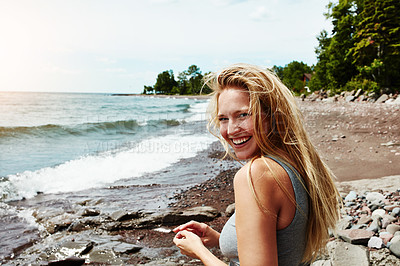 Buy stock photo Young woman, portrait and smile for beach holiday, summer freedom or adventure travel in nature. Female person,  outdoor and happiness for vacation in New Zealand, relax in fresh air for wellness