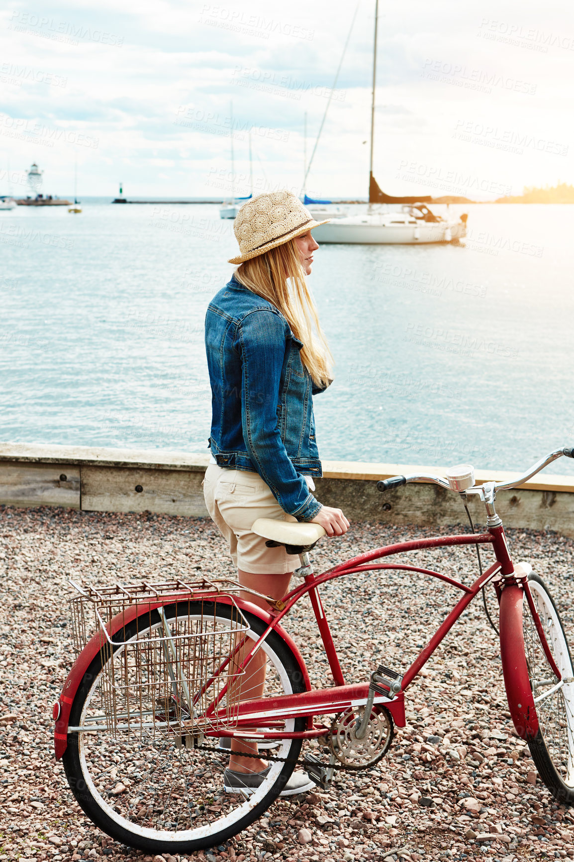 Buy stock photo Thinking, travel and woman with bike by ocean for view, sightseeing and mindset on vacation. Bicycle, cycling and reflection of girl by sea outdoor on trip with transport on holiday by harbor