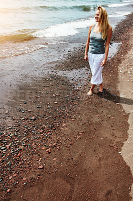 Buy stock photo Smile, woman and walk at beach for travel, adventure and explore nature on holiday. Above, female person and calm morning with ocean water, weekend break and happy with fresh air on tropical vacation