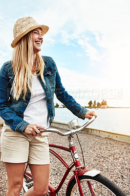 Buy stock photo Woman, bike and travel with smile outdoor for holiday, transport and weekend health. Happy, female person and tourist with cycling, vacation or activity with bicycle for wellness, adventure or break