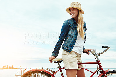 Buy stock photo Woman, bicycle and travel with smile for vacation, transport and weekend health outdoor. Happy, female person and tourist with cycling, holiday or activity on bike for wellness, adventure or break
