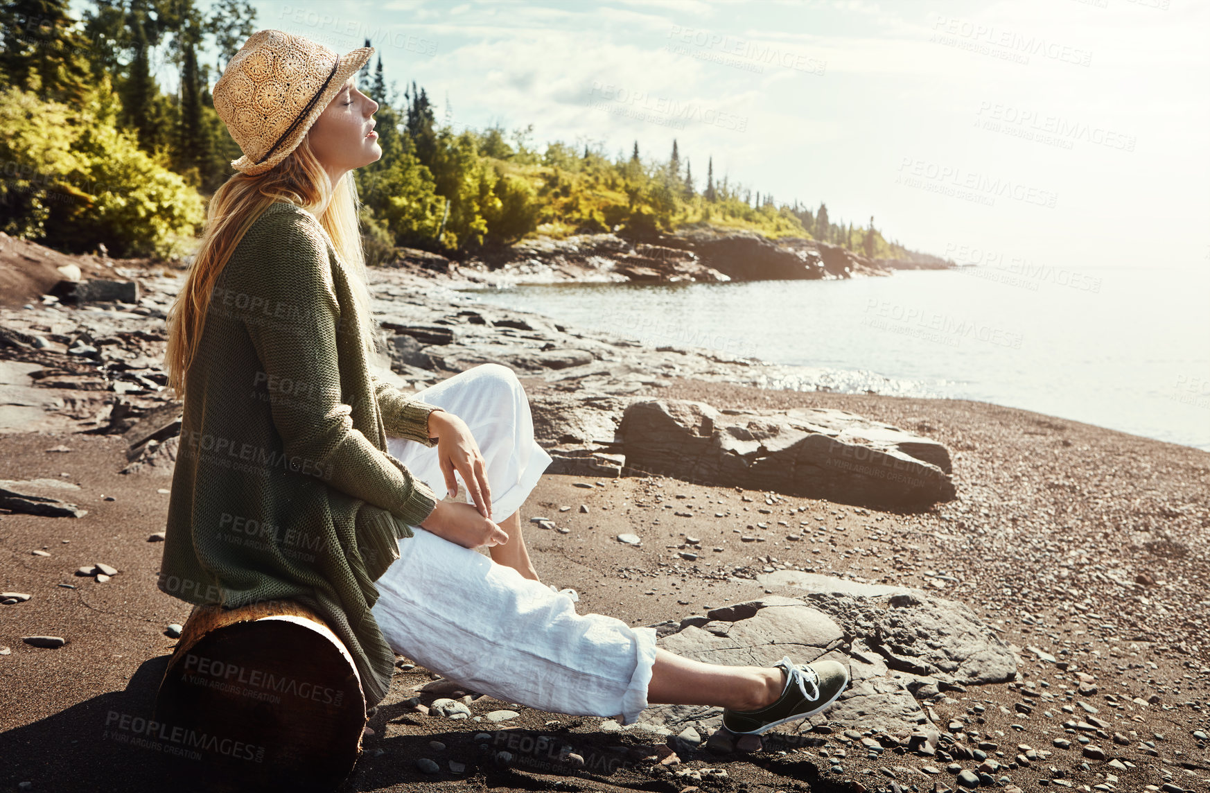 Buy stock photo Island, relax and woman on beach with hat, outdoor holiday and calm adventure in tropical nature. Travel, ocean and girl on vacation with water, blue sky and happy morning peace on coast in Indonesia