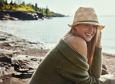 Buy stock photo Relax, thinking and happy woman at lake on vacation, holiday and travel outdoor in Switzerland. Water, smile and young person in nature with summer hat for journey, adventure and tourist on trip