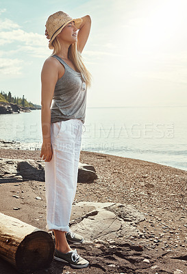 Buy stock photo Outdoor, relax and woman on beach for freedom, vacation and holiday weekend in California with smile. Ocean, girl and carefree for travel adventure, peaceful and enjoy sunshine with calm in sea