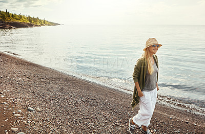 Buy stock photo Walking, smile and woman with holiday by beach, weekend travel trip and tropical getaway for tourism. Sunshine, summer vacation and person with journey by ocean, space and explore seaside destination