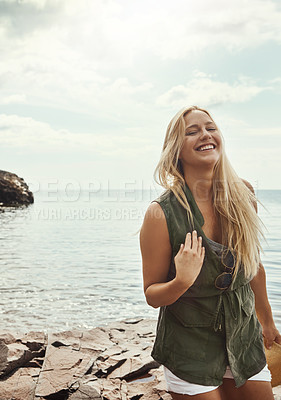 Buy stock photo Portrait of an attractive young woman spending a day at the lake