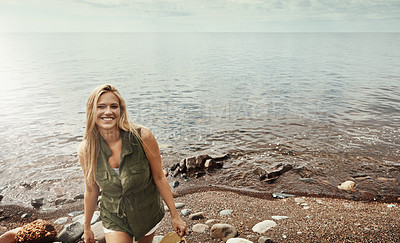 Buy stock photo Portrait of an attractive young woman spending a day at the lake